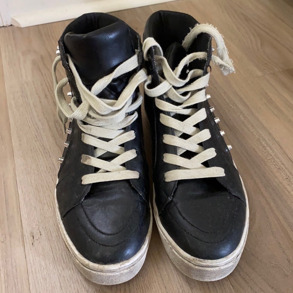 Slightly worn high top sneakers